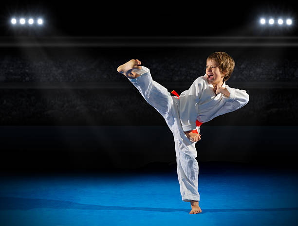 istock Little boy martial arts fighter 627040892