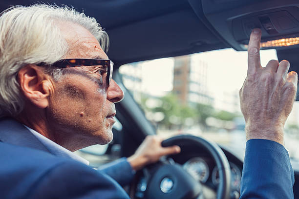 istock Businessman in car calling for assistance 627041104