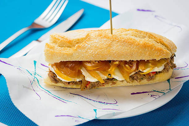 istock Meat sandwich with sweet onion and goat cheese 627042770