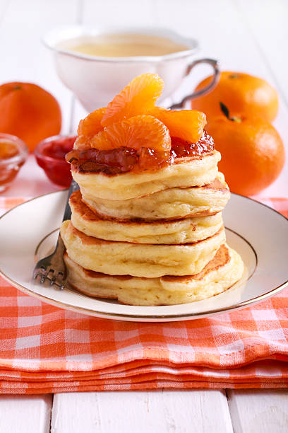 istock Pancakes with tangerine topping, 627044530