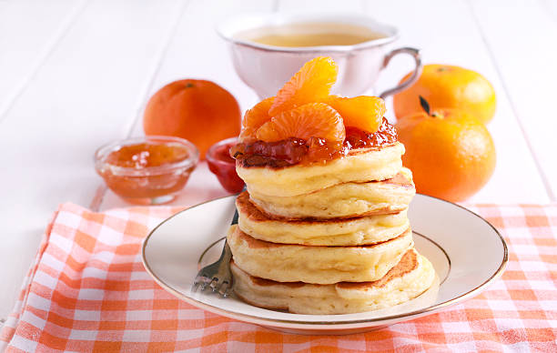 istock Pancakes with tangerine topping 627044570