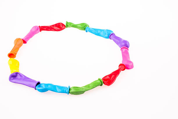istock Little balloons of various color form a circle 627044574