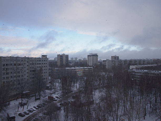 istock It is snowing over the city 627045116