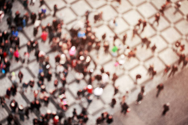 istock Blurred crowd of people. Top view 627047004
