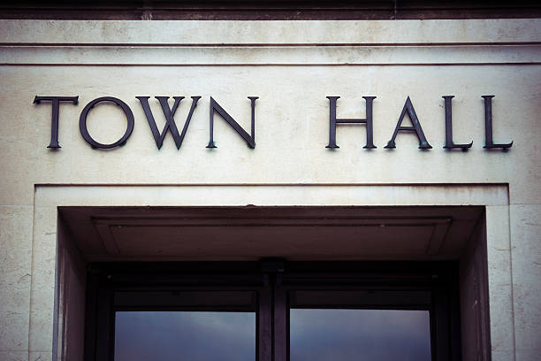 istock Town hall sign at local government office 627048256