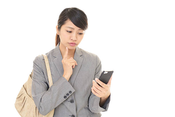 istock Business woman with a smart phone 627068310