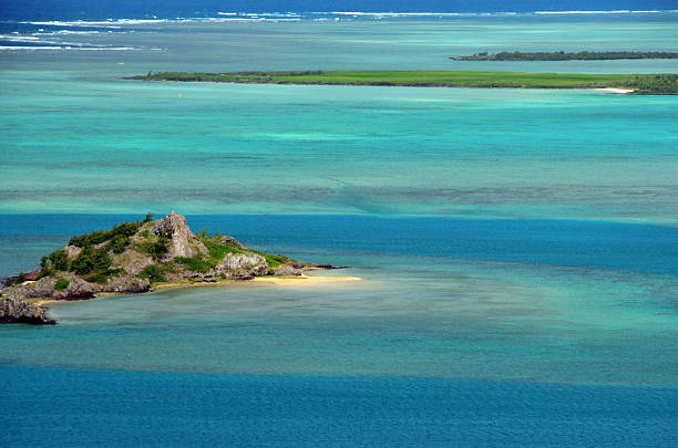Hermitage Island, Rodrigues island, Mauritius: coral reef and tropical waters of the Indian Ocean around the islet, famous for pirate stories and home to a legendary buried treasure - photo by M.Torres