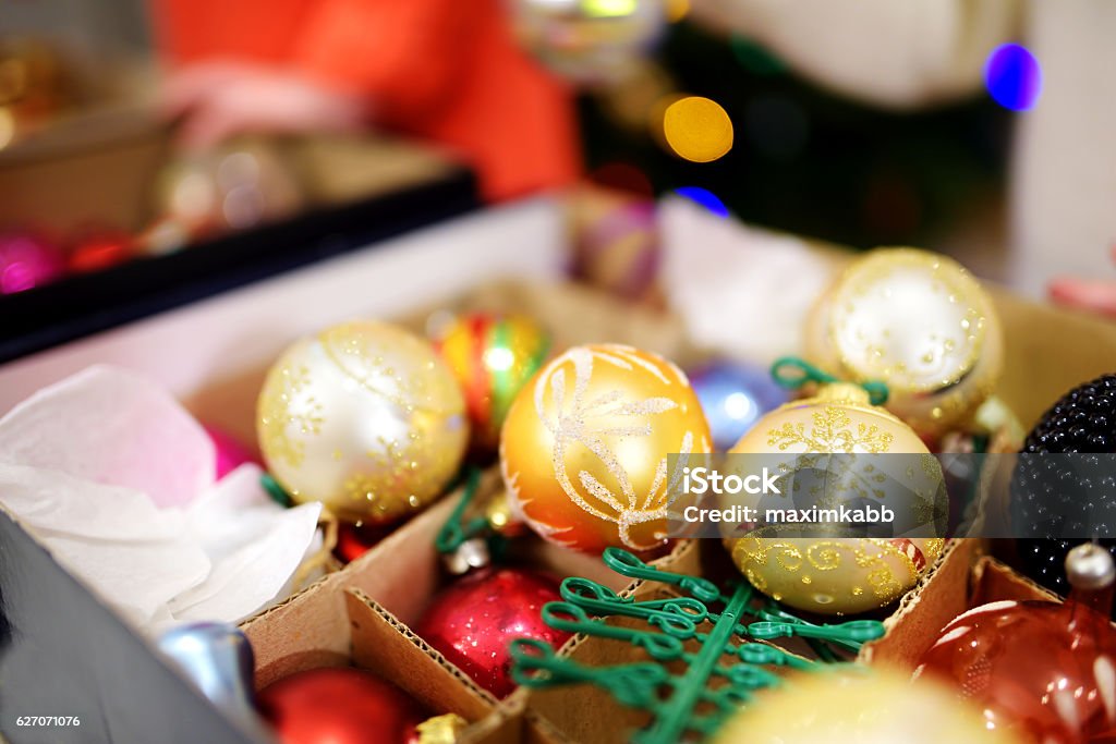 Colorful Christmas decorations in a boxes Various colorful Christmas decorations in a boxes Storage Room Stock Photo