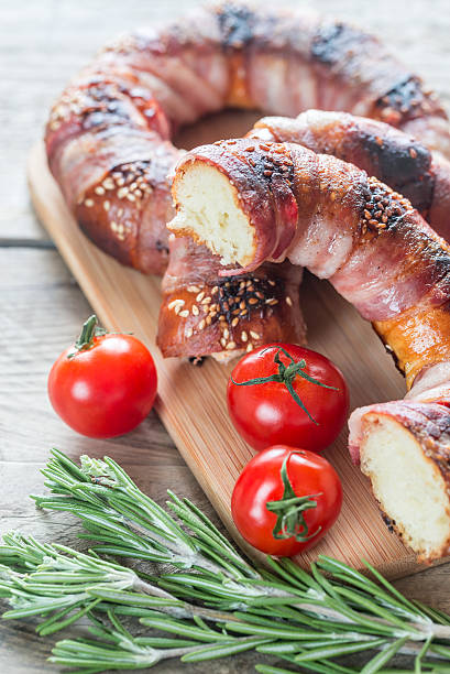 istock Bagels with sesame wrapped in bacon rashers 627076140