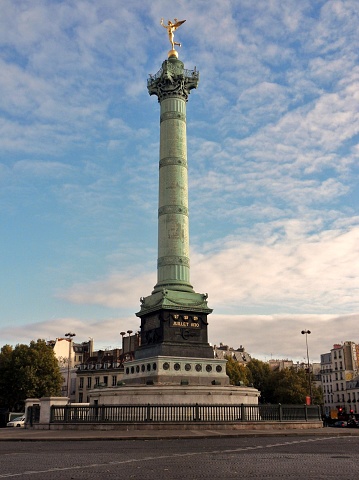 Paris, France - November 5, 2010: The July Column at the Bastille Square erected where once stood a century fortress, turned into a prison in the XVII century, assaulted 14 July 1789 thus starting the French Revolution. Inside, a spiral staircase leads to the roof balcony at a height of about 40 meters