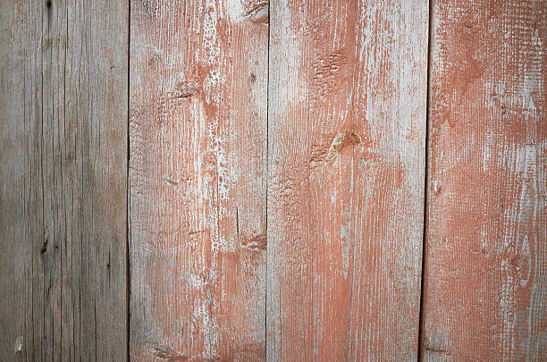 istock Old wooden gray red grunge plank wall texture background 627076750