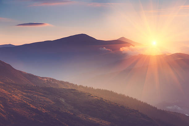 Beautiful landscape in the mountains at sunrise. stock photo