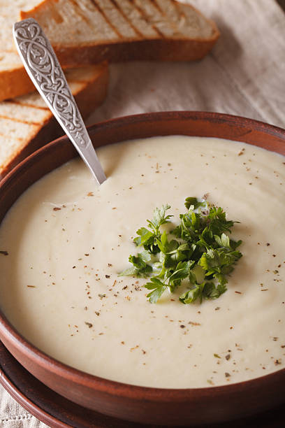 istock French cream soup du Barry in bowl macro. vertical 627080940