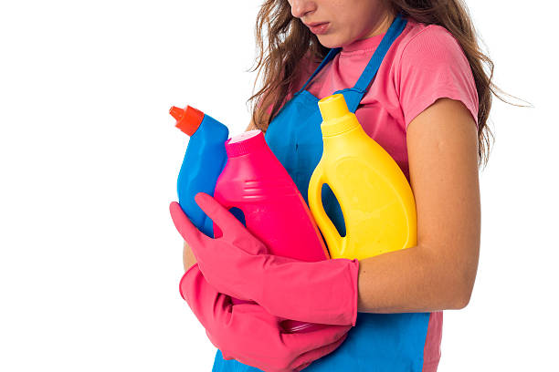istock young maid woman with cleansers 627088772