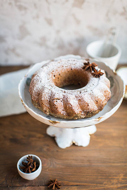 istock Christmas cake with raisins and cinnamon on the table 627091564