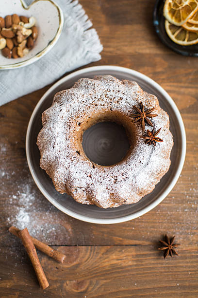 istock Christmas cake with raisins and cinnamon on the table 627091912