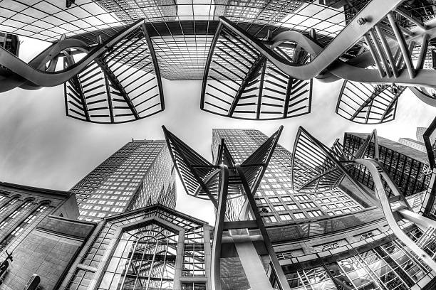 Calgary, Canada - June 14, 2016: Black and white rendering of Calgary's downtown business district along Stephen Avenue, a popular and busy pedestrian mall. Stephen Avenue Walk in downtown Calgary is a National Historical District with over 30 restored buildings in the area that feature architectural styles from the late 1800s to the 1930s.