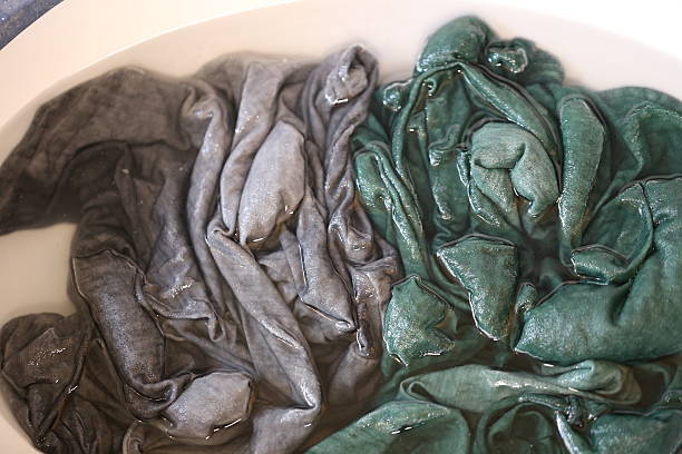 istock Damp Clothes, Manual Washing in the Sink. 627100648