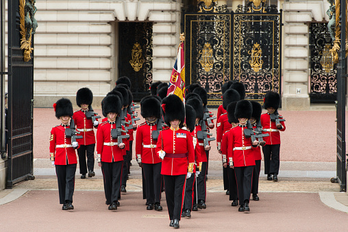 London, United Kingdom - June 21, 2016: The marching Coldstream Guard during the Changing of the Guards ceremony at Buckingham Palace early in the day.