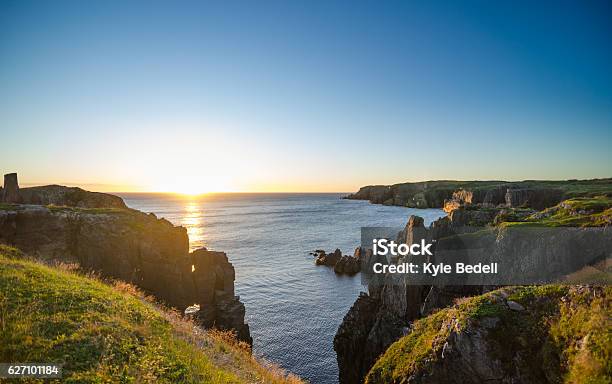 Dramatic Sunrise Cliffs At Cable John Cove Newfoundland Stock Photo - Download Image Now