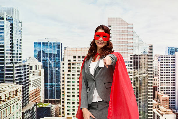 istock Smiling superhero outdoor and pointing at camera 627101470
