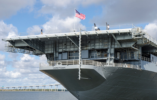 Norfolk, USA - June 9, 2019: Image of the battleship USS Winston Churchill anchored in the naval base of Norfolk, Virginia.