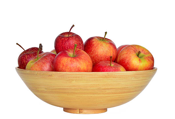 istock Bowl with fresh red apple on the white background 627101740