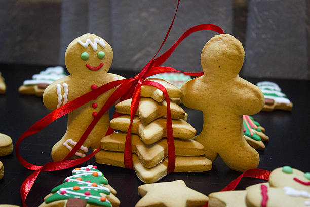 istock New Year, gingerbread men, christmas tree, stars 627102294