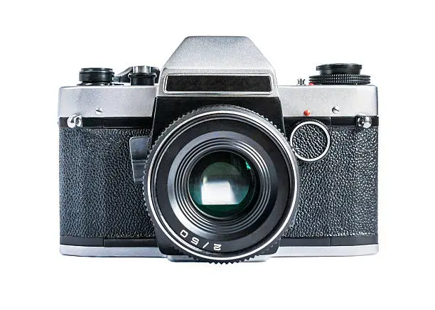 Photo of Retro film photo camera isolated on white
