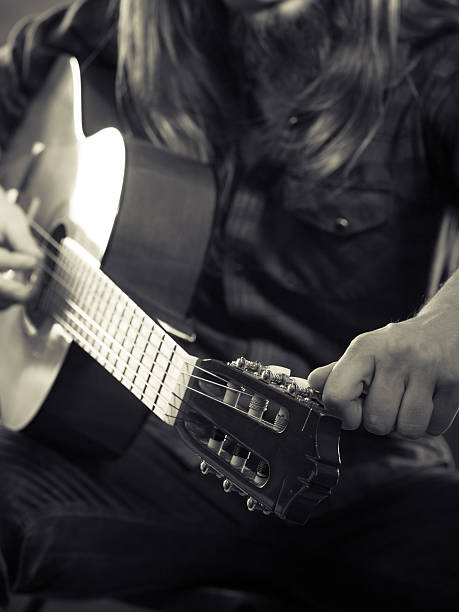istock Black and white picture with man and guitar. 627102858