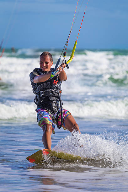 istock Wan riding kite surf on sea waves 627102904
