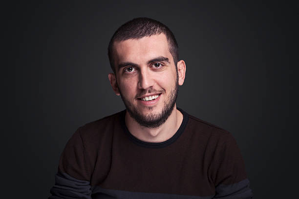 istock Smiling young man portrait 627110494