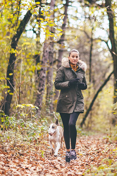 istock Jogging in the morning with the dog 627111194