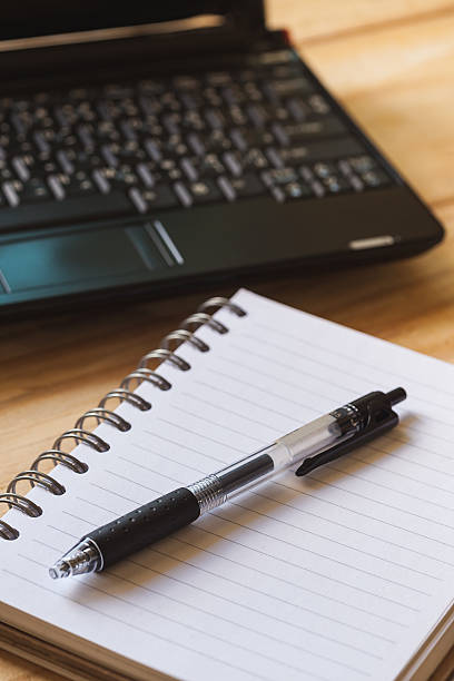 istock Pen, Blank notepad and laptop on the office. 627117706