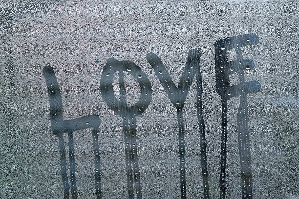 istock Word love written on glass 627125720