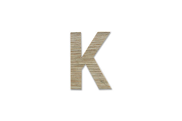 istock english alphabet K made from wood isolated on white background 627127022