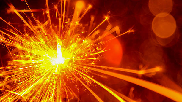 istock Party sparkler  with abstract circular bokeh background 627128904