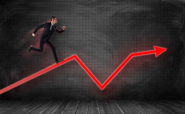 istock Small businessman running on huge red kinked arrow 627130196