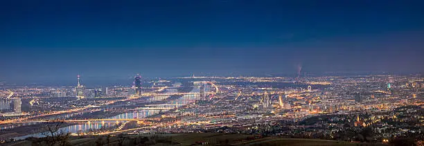 Aerial panorama of Vienna at night.