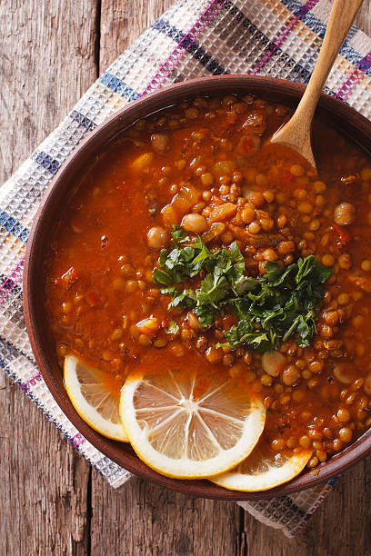 istock Arabic cuisine: Harira soup close-up. vertical top view 627148306
