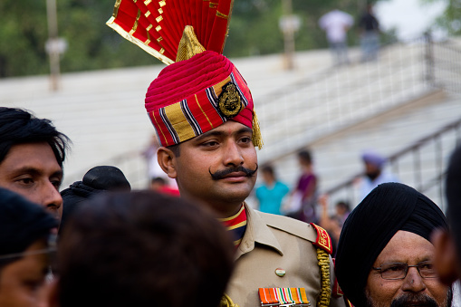 Amritsar, Punjab, India - May 4, 2013: Portrait of a soldier at the India-Pakistan border. Shot during the daily Wagah border ceremony performed by soldiers.