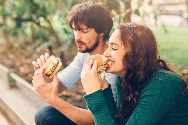 istock Happy couple eating 627156258