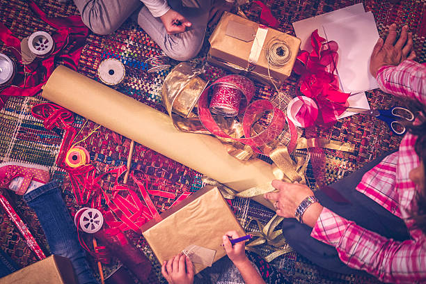 istock Wrapping and Decorating Christmas Presents 627156844