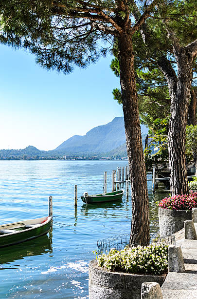 istock Vacation summer serene Lugano lake surrounded by hills in Morcote 627157316