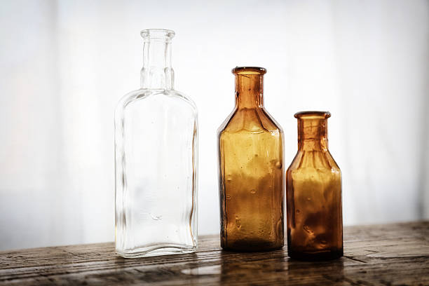 istock Still life with glass bottles 627163404