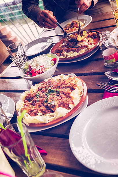 istock Eating Parpadelle with Goulash and Fresh Salad 627163468