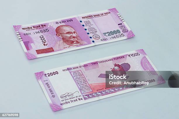 New Indian Currency Of 2000 Rupee Notes Stock Photo - Download Image Now - Indian Currency, 2000, Paper Currency