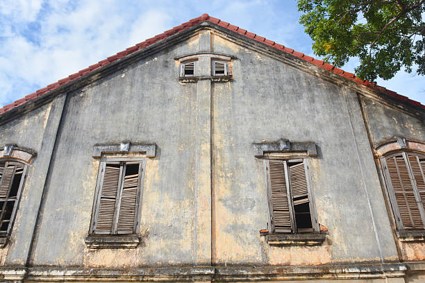 Old building with wooden windows stock photo