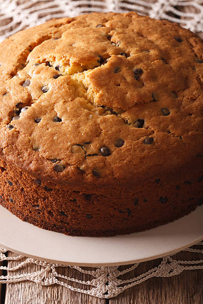 istock Homemade sponge cake with chocolate chips close-up. Vertical 627170310