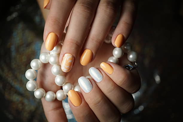 istock Beautiful bright natural nails with perfect clean manicure. 627171054